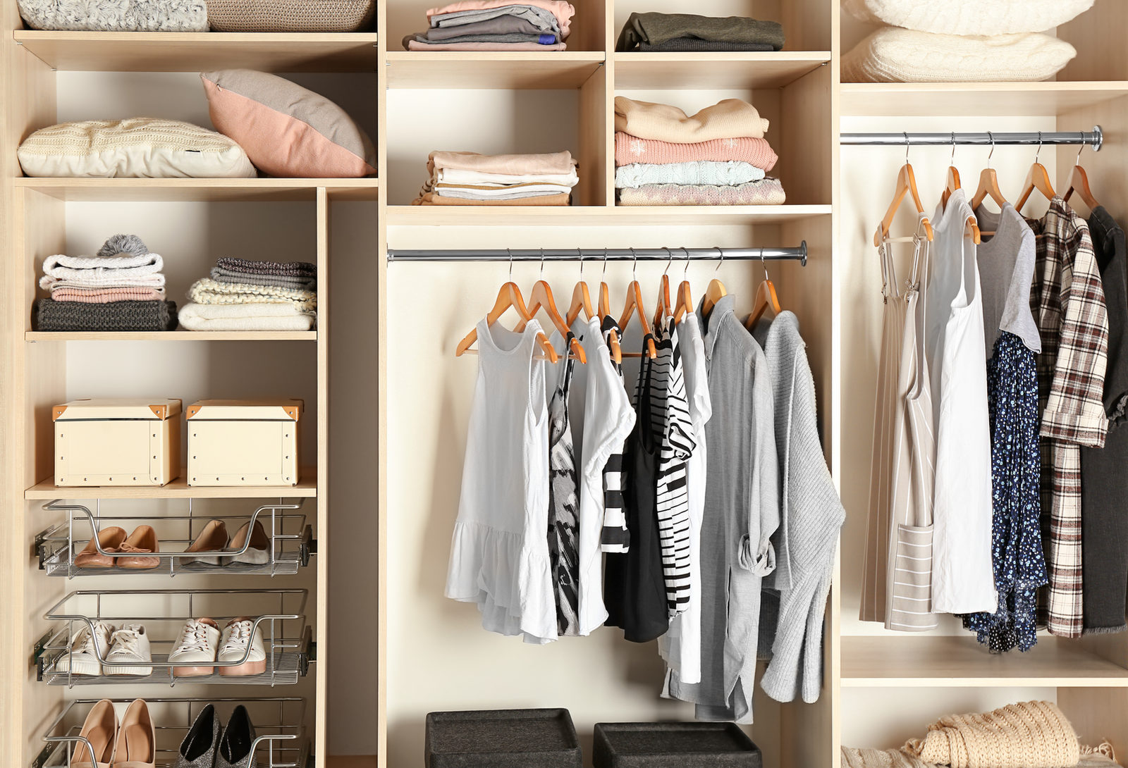 Well Organised wardrobe folded clothes and all in a system.