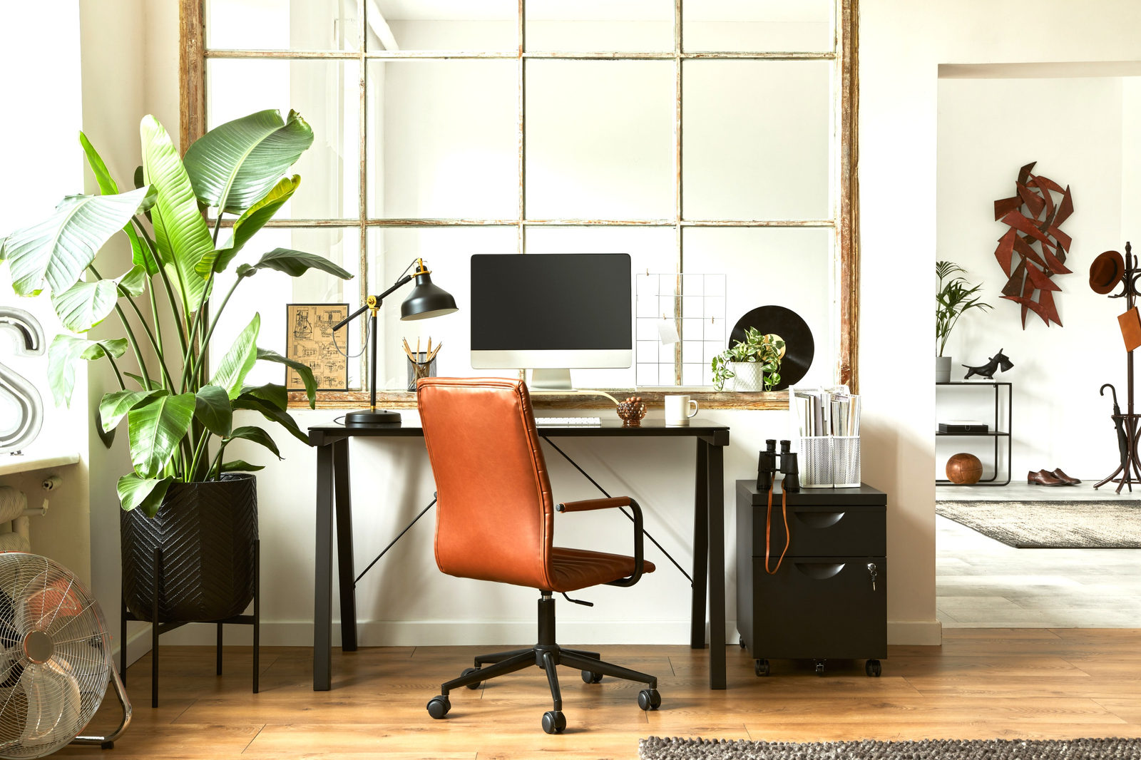 Home office set up with a chair and desktop.